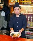 　「熱海飯店」を営む三浦渉さん＝６月、静岡県熱海市