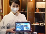 浴場の空き確認などに活用されるタブレット端末＝下呂市森、水鳳園