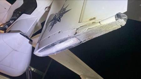 　海上保安庁の大型無人航空機「シーガーディアン」の尾翼。北九州空港の滑走路に接触して損傷した（海上保安庁提供）