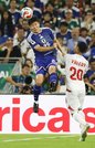 日本―チュニジア＝後半、競り合う鈴木淳之介（左）＝モンテレイ（共同）