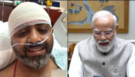 　２日にビデオ通話するインドのモディ首相（右）とスミット・マッチャール機長（モディ首相のユーチューブ映像から、ＡＰ＝共同）