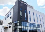 　富士フイルム子会社の大分工場に開所した新棟＝２１日午後、大分市