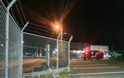 　ガス漏れが発生した疑いのある現場付近＝２７日午後９時ごろ、福岡県大牟田市