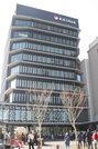 グランドオープン記念式典が開かれた東濃信用金庫の新本店ビル＝多治見市本町