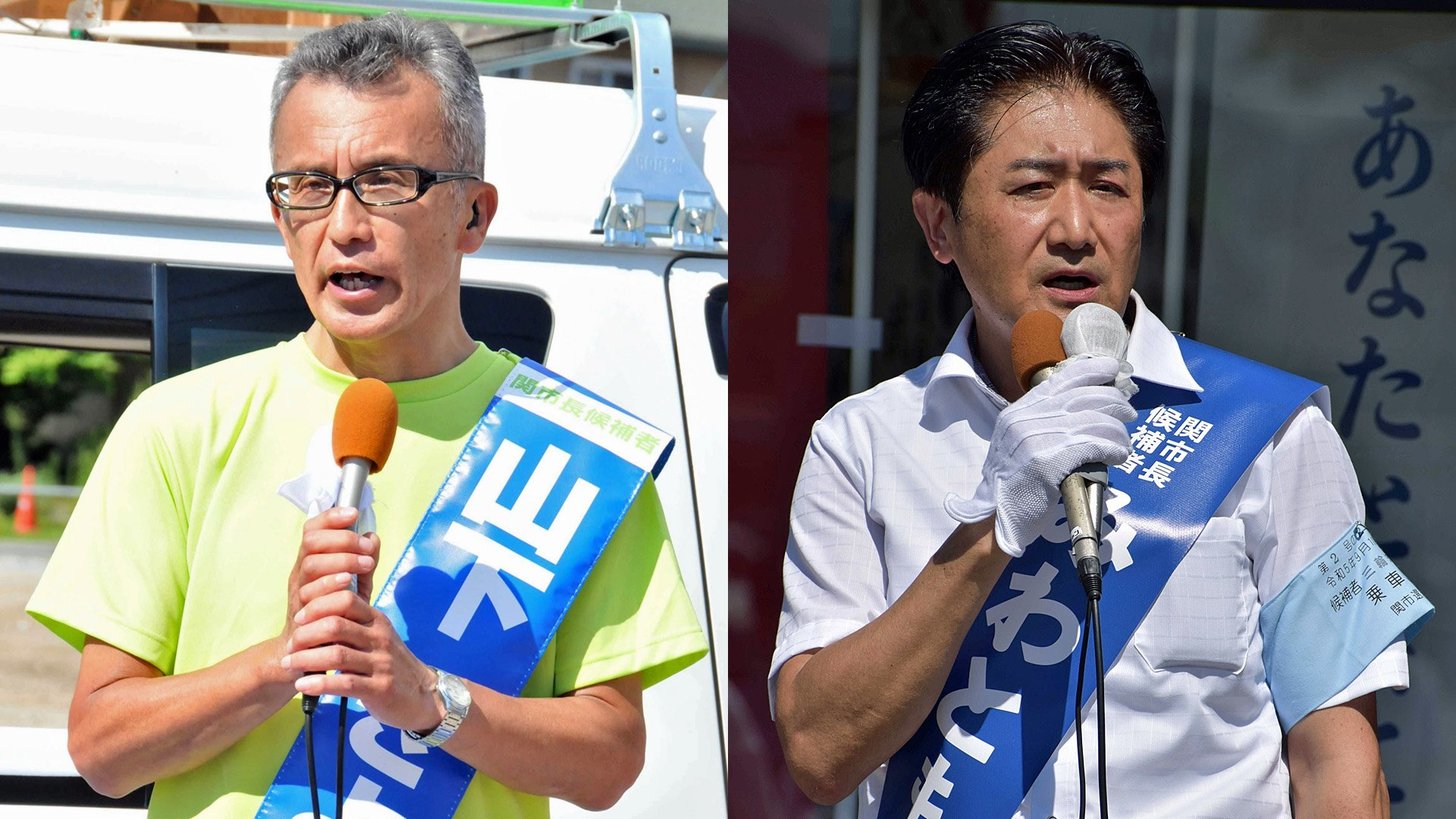 山下清司候補（左）と三輪知生候補