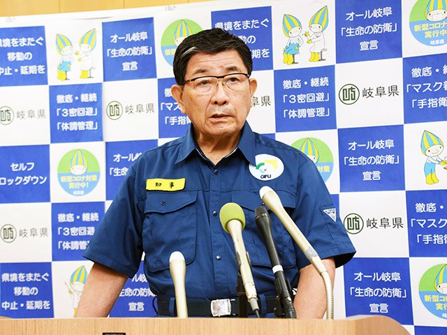 国にまん延防止等重点措置の適用を要請する方針を示した古田肇知事＝１４日午後４時４８分、県庁