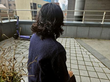 　韓国軍によるビラ散布について証言する元軍人＝１４日（共同）