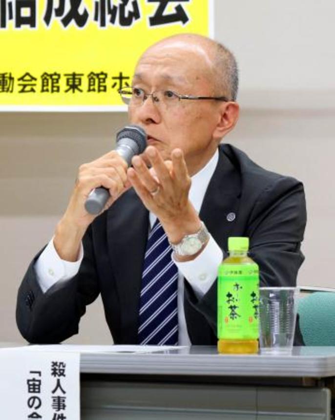 　ＤＮＡ型運用の法制化を求める団体の結成総会で発言する高羽悟さん＝１３日午後、名古屋市