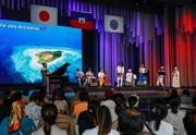 　ナショナルデーの最終回となったハイチの式典で披露されたパフォーマンス＝１１日午後、大阪市此花区の夢洲