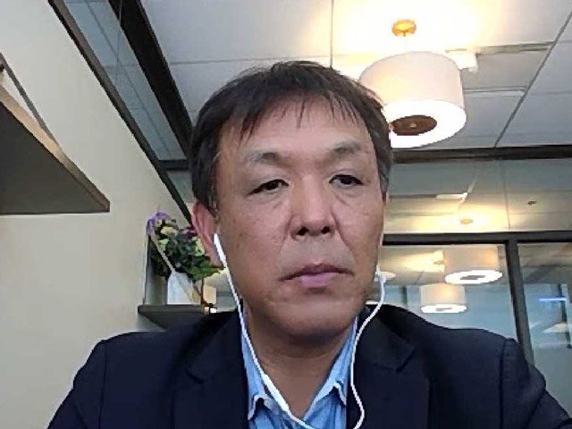 タイ・バンコクからオンラインで取材に答える臼井英樹さん