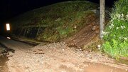 大雨により土砂が流入した道路＝１日午後、高山市丹生川町