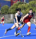 女子準々決勝・東海学院大×駿河台大＝先制点を決め快勝の流れをつくった東海学院大の高木（左）＝川崎重工スタジアム